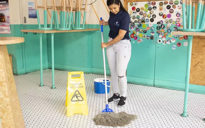 United Facilities operative delivering a professional floor-cleaning service