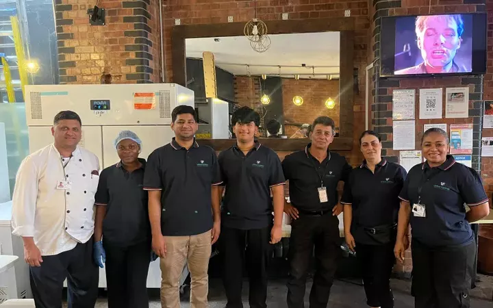 United Facilities team members working together at a client hospitality site